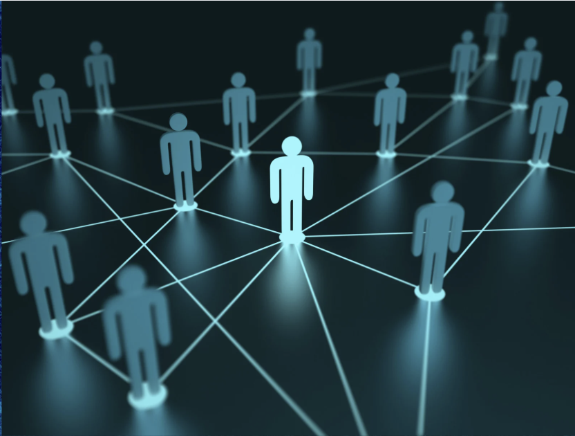 A network of connected figures with one illuminated at the center